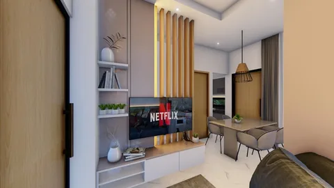 Ruang keluarga rumah Bumi Citra Regency Serpong dengan lantai granite tile 60x60 dan area televisi